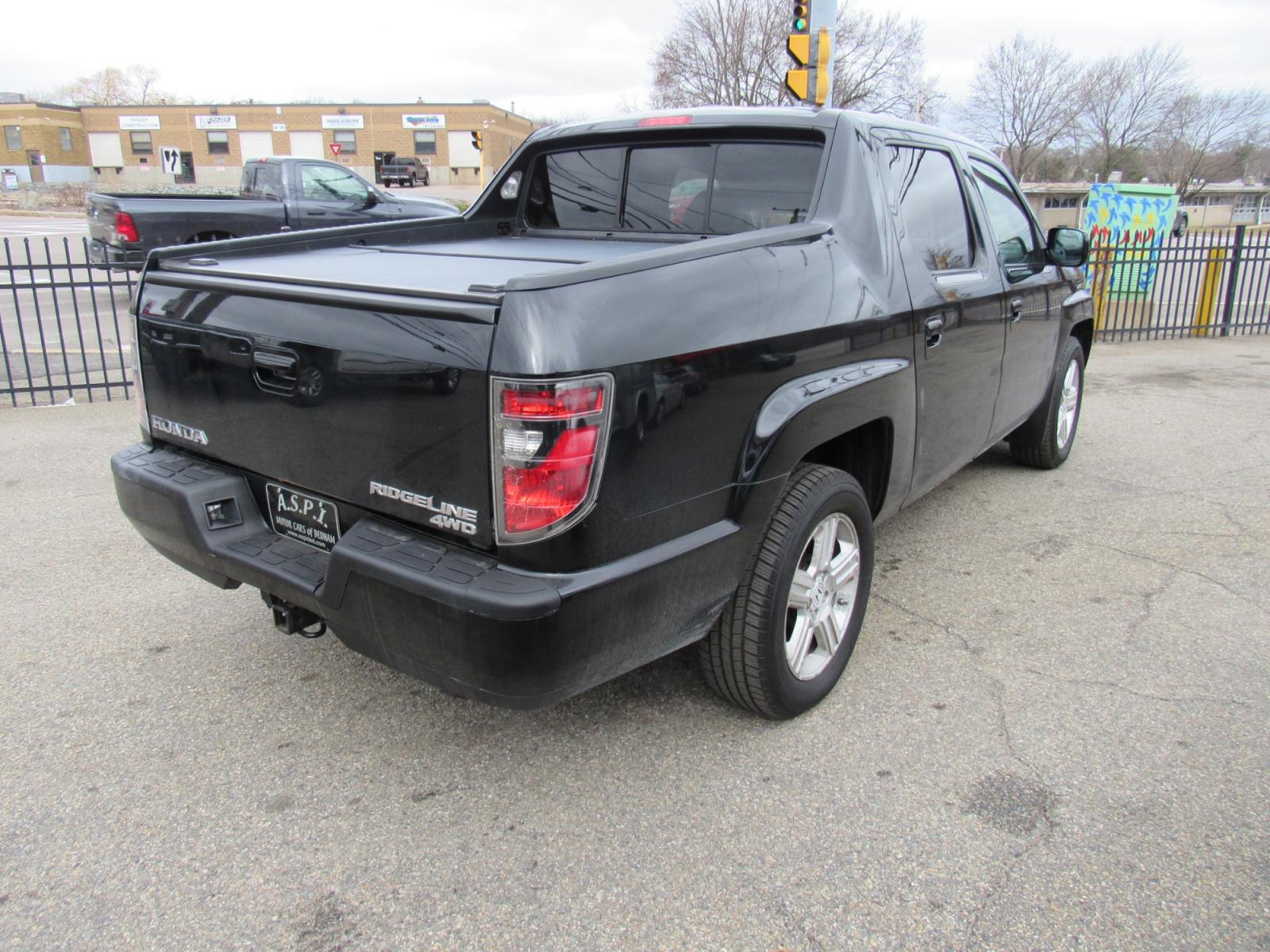 2012 BLACK /Gray Honda Ridgeline RTL (5FPYK1F56CB) , Automatic transmission, located at 215 Milton St, Dedham, MA, 02026, (781) 329-5144, 42.241905, -71.157295 - This nice Ridgeline is in excellent condition. Runs like new. All ASPI Motor Cars vehicles are fully serviced before they are delivered to assure the highest quality used vehicles. Comes with a 3/3 warranty included in the price. call for details. Prices on all vehicles do not include $299.95 Doc - Photo #4